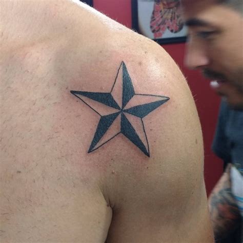 star tattoo on shoulder meaning|Decoding Star Tattoo Meanings and Best Body Placements